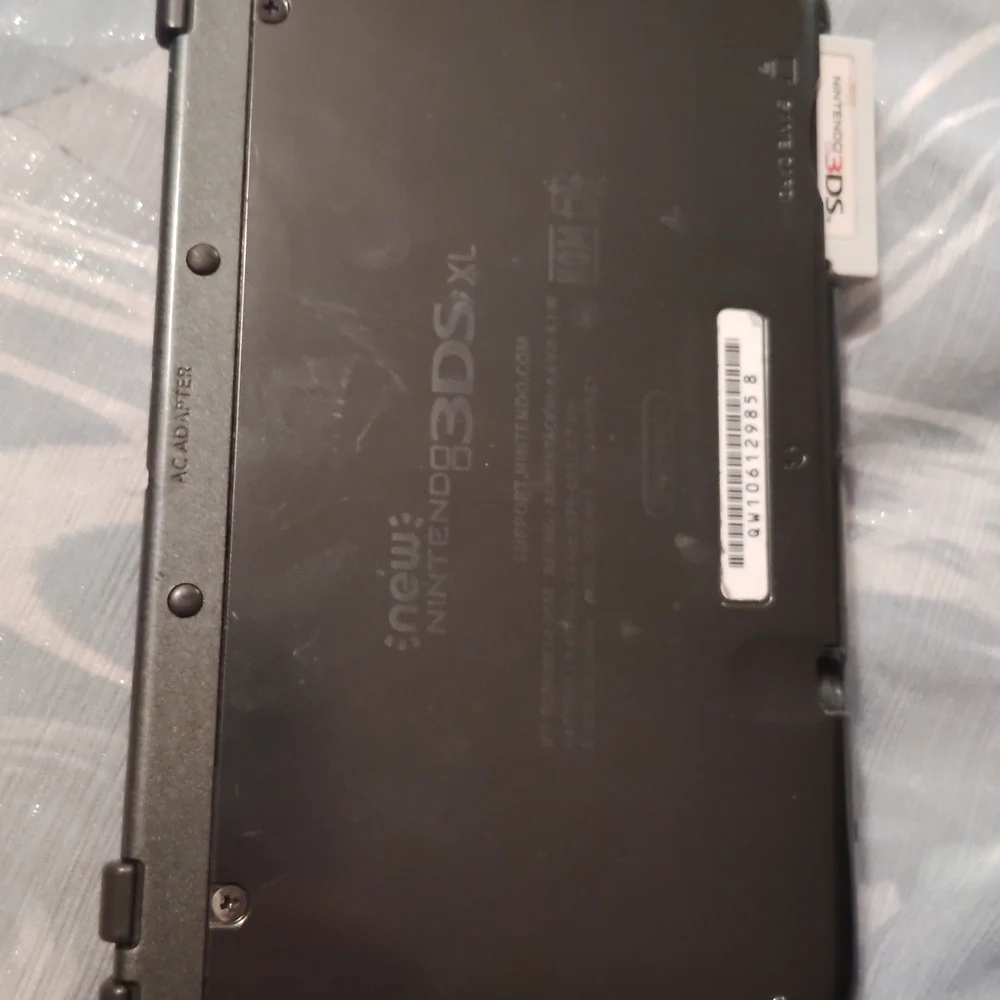 Nintendo DS with Red and Black Case